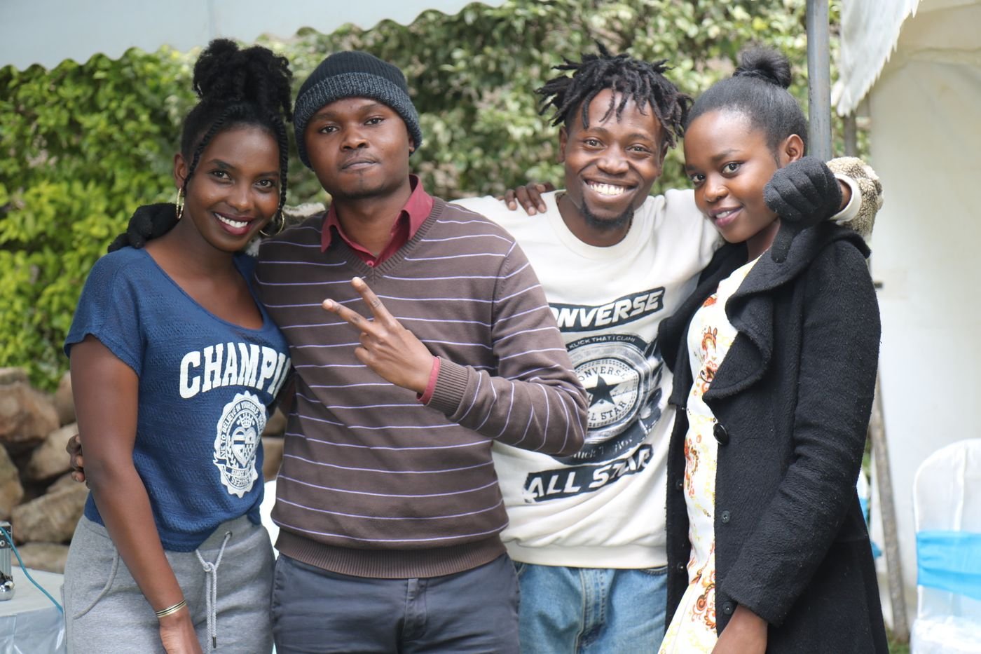A group of young friends smiling together in Nairobi